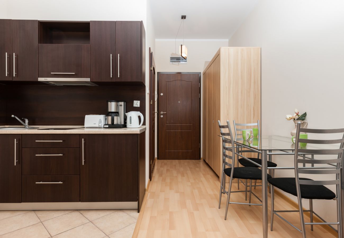 kitchenette, dining area, wardrobe, dining table, chairs, coffee table, kettle, toaster, rent