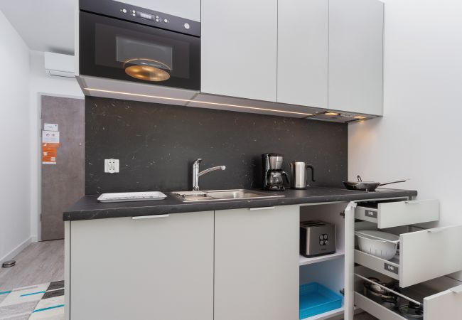 kitchen, kitchenette, fridge, kettle, induction hob, toaster, coffee maker, microwave, cupboards, apartment, interior, rent