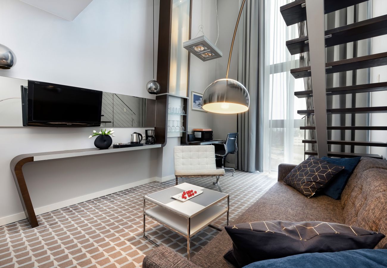 living room, kitchenette, armchair, tv, wardrobe, interior, rent, apartment, hotel, air-conditioning